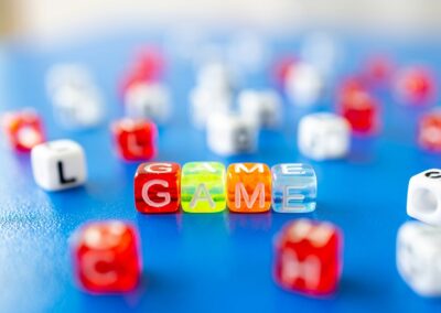 red white yellow and blue plastic dice